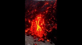 Snowboarding Next to Flowing Lava