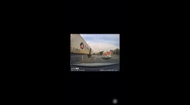 Truck carrying steel narrowly avoids collision in China