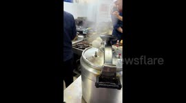 Chinese chef shows off 'flying eggs' trick as he uses pressure cooker to make eggs hover