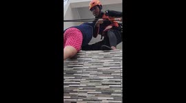 Woman rescued from bedroom window during flood in Indonesia