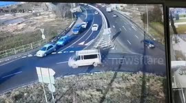 Out-of-control dump truck smashes into cars at roundabout