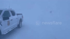 Blizzard causes whiteout conditions and travel warnings in Iowa, USA