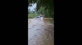 Driver swept away by severe floods in Indonesia