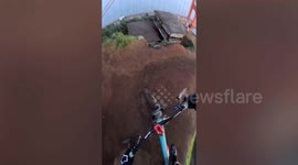 Cyclist conquers sheer cliffs and treacherous staircases in death-defying rides