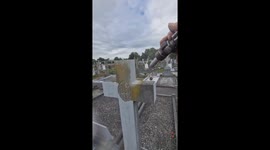 Old headstone brought back to life as skilled man uses sandblasting for restoration