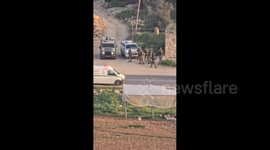 West Bank: Israeli forces arrest an injured Palestinian youth during their raid on Al-Hijra village south of Hebron in the West Bank