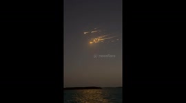 Flaming debris from failed SpaceX launch streaks across sky