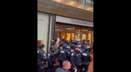 Police clash with protesters at Barnard College during bomb threat evacuation