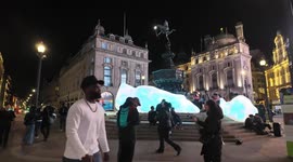 Inflatible Artwork surrounds Eros in Picaddily Circus.