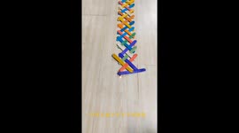 Domino effect with ice cream sticks and firecracker sparks in China