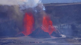 Lava fountains spew from volcano at Kilauea summit in Hawaii