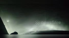 Drivers battle through fierce blizzard in Iowa