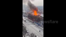 Gas cylinder launched across road following series of explosions at residential complex in China