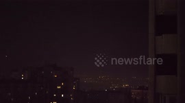 Odesa, March the 7th, 2025, flash from explosion of a drone targeting the sea port