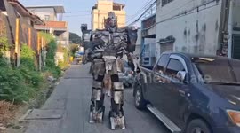 Mechanic wears giant Transformer costume to walk through neighbourhood