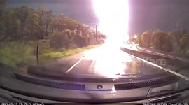 'Jesus!' Lightning strikes train tracks leaving passing motorists in shock