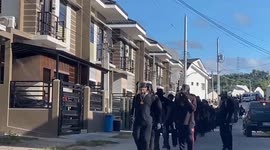 Police probe chilling video of 'cult' marching through street in the Philippines