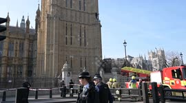 London, UK. 8 March 2025. Pro Palestine man climb on the Big Ben tower by Parliament.