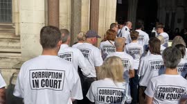 UK: Climate activists Amy Pritchard reads a statement outside the Royal Courts