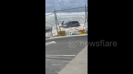 Car rescued from storm surge Cyclone Alfred full legnth video Combination of 2 videos
