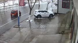 Car crashes into lorry trailer as it slips on icy road and slides into other lane