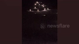 Skiers use phone flashlights to get to safety at night after power cut caused cable cars breakdown