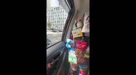 Passenger astonished by taxi with entire grocery shop stacked across seats