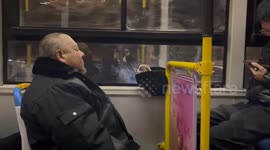China: Uncle Carries Puppy in His Hat