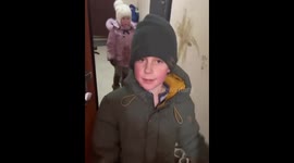 Children return home covered in mud and start cleaning in Maladzyechna, Belarus