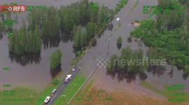Australia: Helicopter Captures Dramatic Rescue of Driver Trapped in NSW Floodwaters