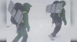 Spain: Mountain Rescue Heroes Save Two Stranded Hikers in Blizzard Hell