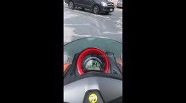 Motorcycle rider finds tiny gecko clinging to his leg