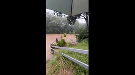 Floods surge through fields in Pinjarra Hills, Australia