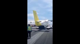 Seaplane lands on floats after regular landing gear malfunctions