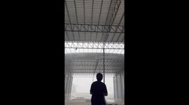 Strong winds blow off roof during rain in Khon Kaen, Thailand