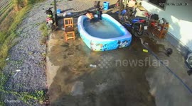 Playful moment as wife jokingly scares husband and son in Khlong Luang, Thailand
