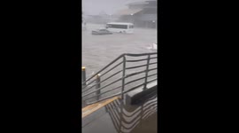 Flash flood leaves debris and damaged cars in Hervey Bay, Australia
