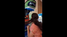 Girl's attempt to punch the target pad machine backfires hilariously