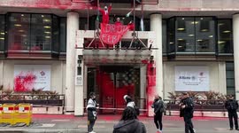 UK: Activists from the group Palestine Action climb on the entrance of Allianz offices in the City of London