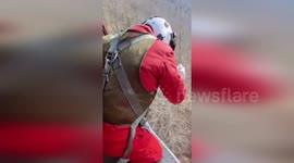 Helicopter rescues father, son and their pet dog from Italian hills