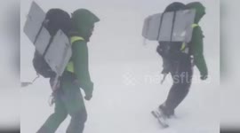 Mountain rescue team saves two hikers stranded in blizzard in Spain