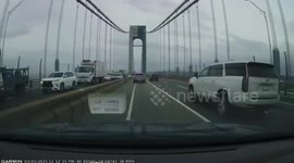 Loose board crashes into car behind in New York