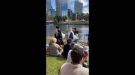 Keep ya chippies safe! While at a festival two huge seagulls in costume approach a person in goth attire carrying hot chips and won’t let them go.