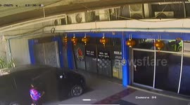 Bungling worker accidentally crashes car through office glass front