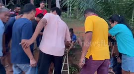 Panicking woman rescued from 23ft deep well in Thailand