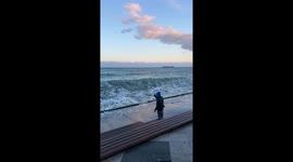 Unexpectedly Strong Wave Crashes Over Embankment