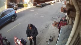 Pensioner struggles to cling to scooter as it zooms round and round