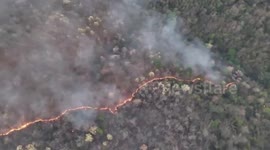 Wildfires spread across hillsides in northern Thailand