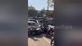 Jeep driver crashes through cars and scooters in India