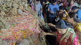 Married women's gather around a bonfire and pray and perform rituals Holika Dahan in Northern India